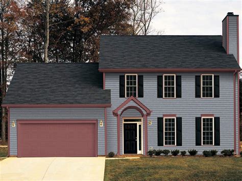 gray house red metal roof|gray exterior with black trim.